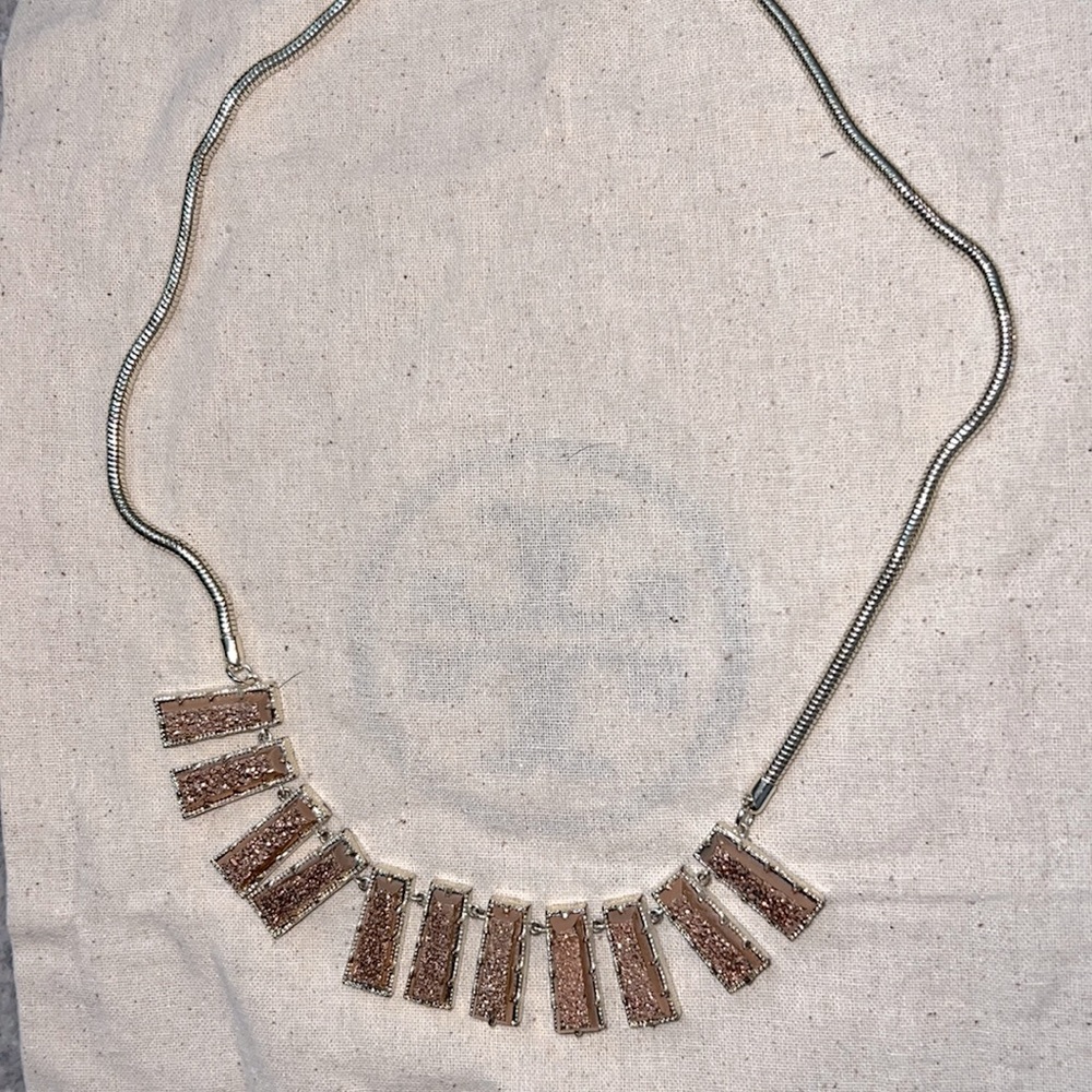 Angelina bib necklace by Kendra Scott in gold chain and rose gold drusy